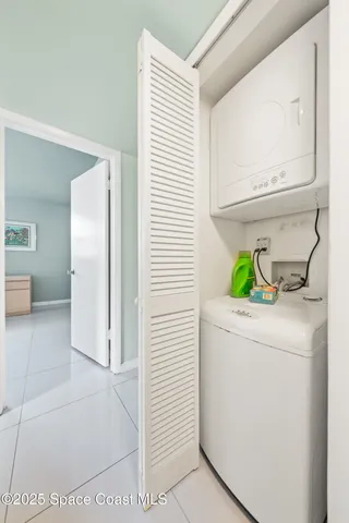 a utility room with washer and dryer
