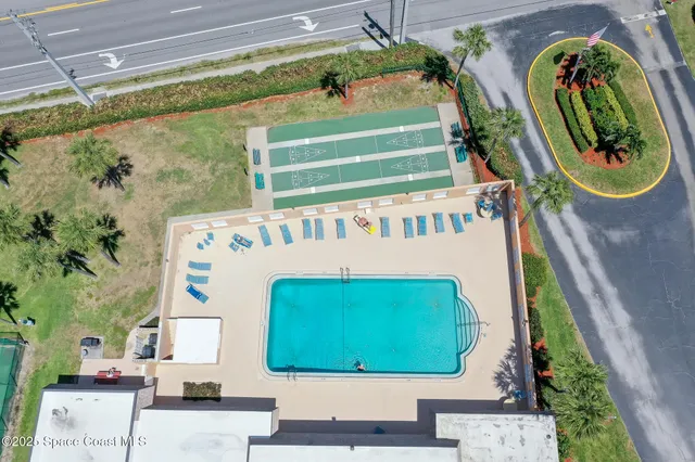 a picture of a park with a bench