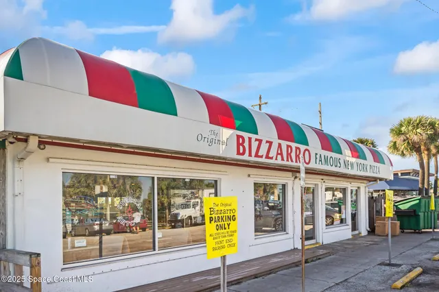a view of a building with the street