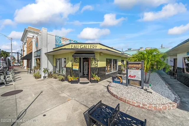 a view of a chairs with a small yard