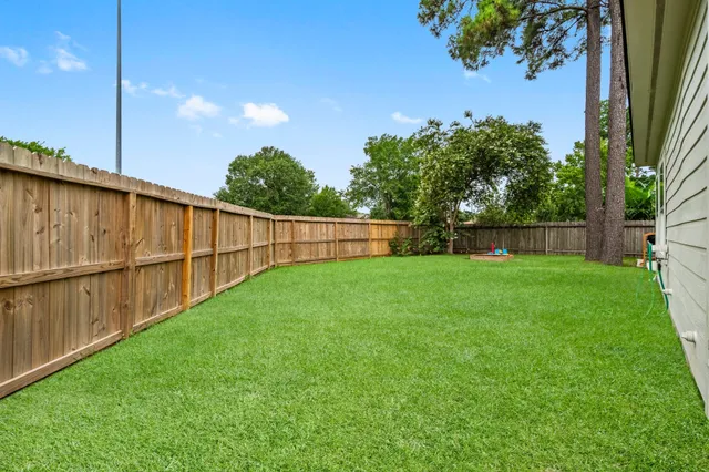 a view of a backyard with a garden