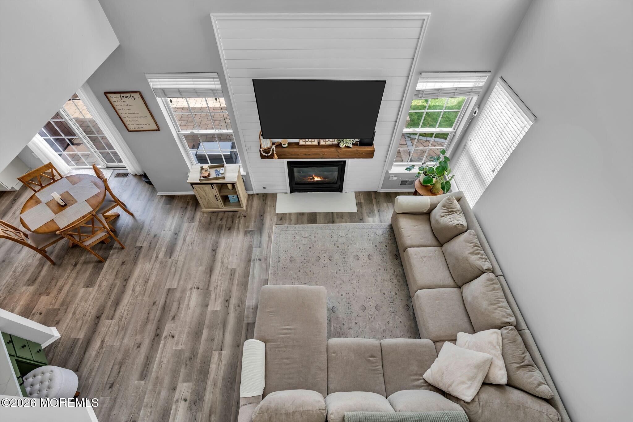 12 Lancaster Way Jackson, NJ 08527 - Photo 25 of 54 a living room with furniture and a flat screen tv