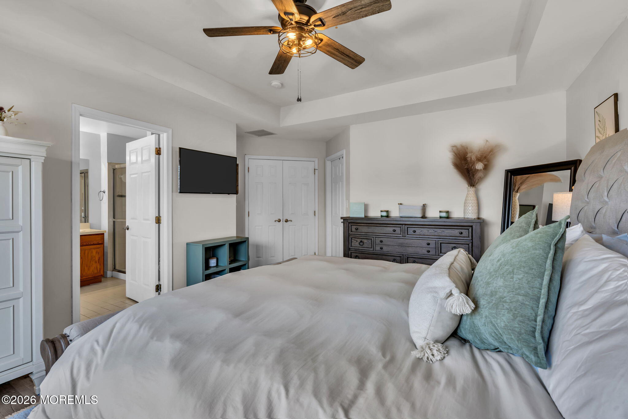 12 Lancaster Way Jackson, NJ 08527 - Photo 36 of 54 a bed room with a bed and a television