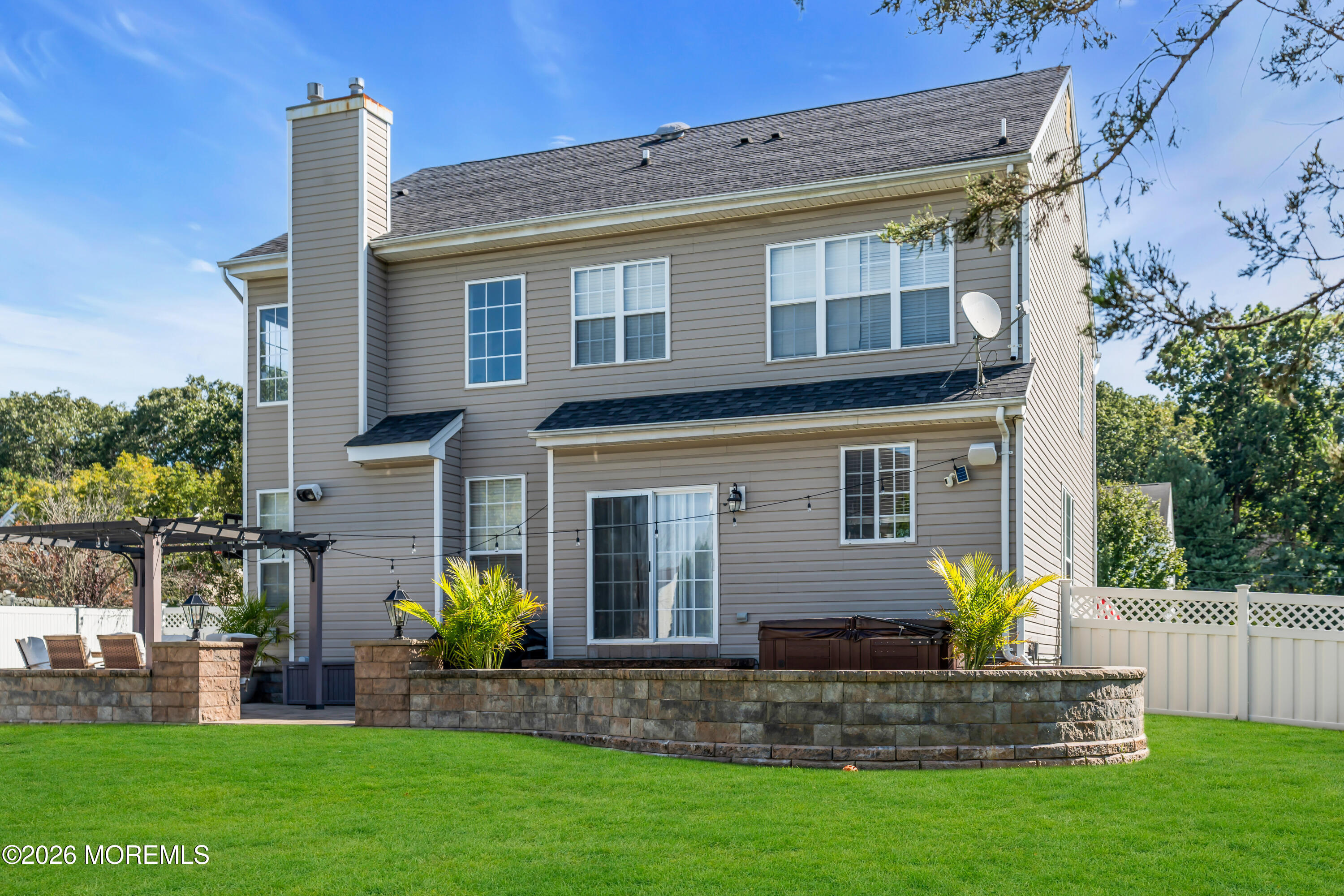 12 Lancaster Way Jackson, NJ 08527 - Photo 46 of 54 a front view of a house with garden