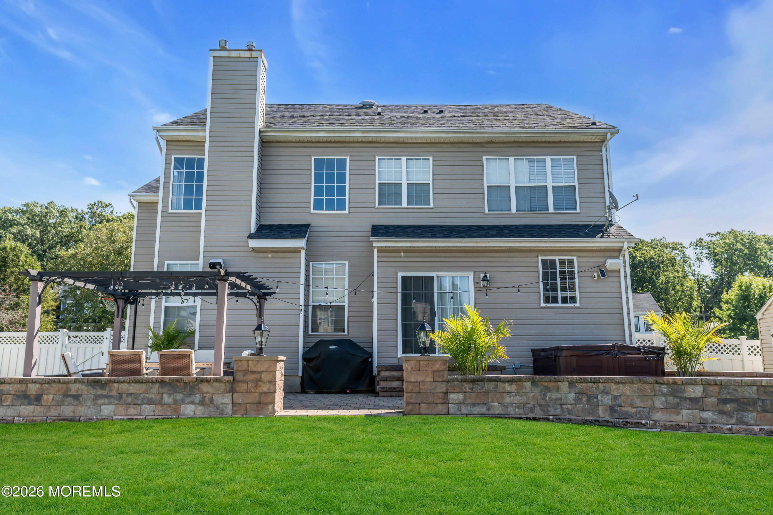 12 Lancaster Way Jackson, NJ 08527 - Photo 47 of 54 a front view of house with yard and green space