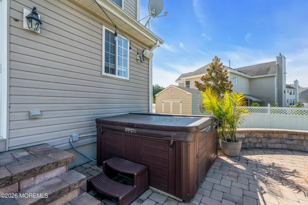 a view of a swimming pool with a yard