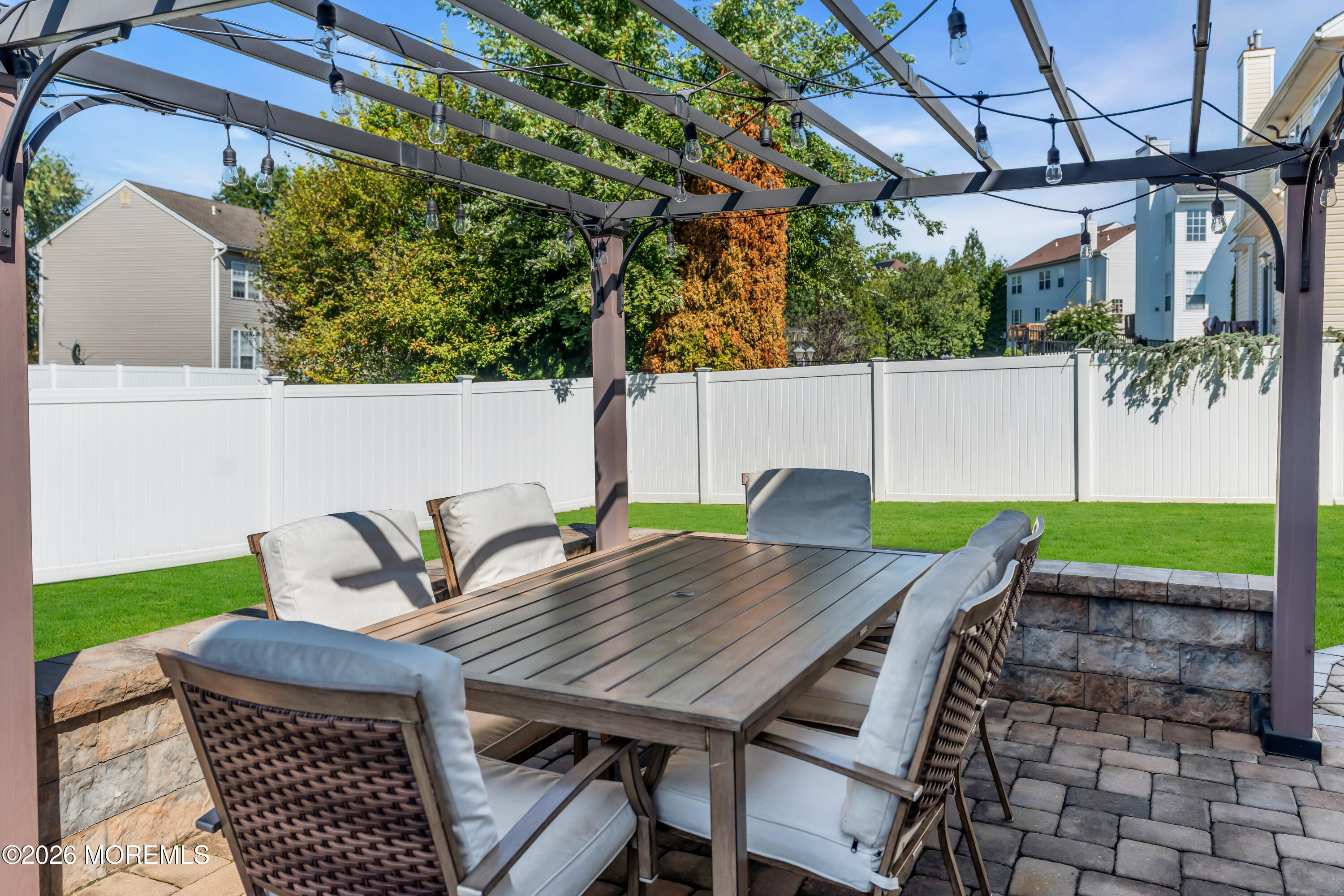 12 Lancaster Way Jackson, NJ 08527 - Photo 49 of 54 a view of outdoor dining space with a table and chairs