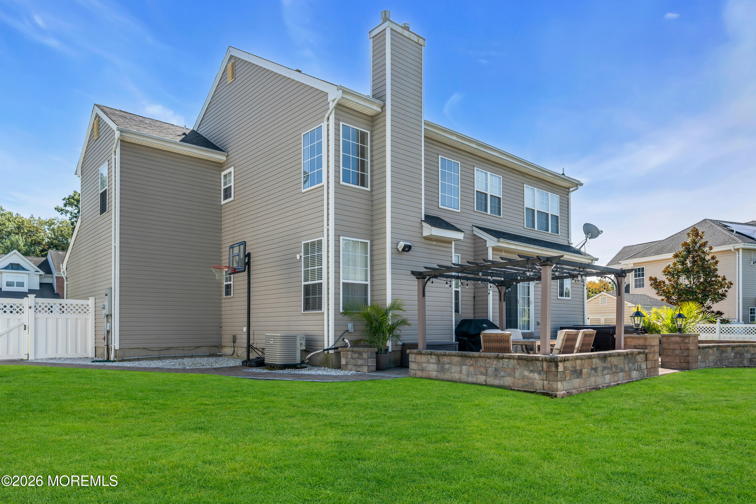 12 Lancaster Way Jackson, NJ 08527 - Photo 54 of 54 a view of a patio with couches and a table and chairs with plants