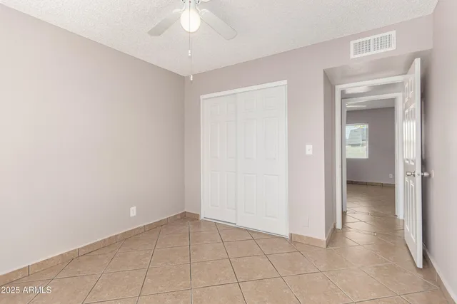 an empty room with a bathroom