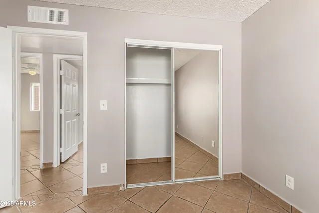 an empty room with closet