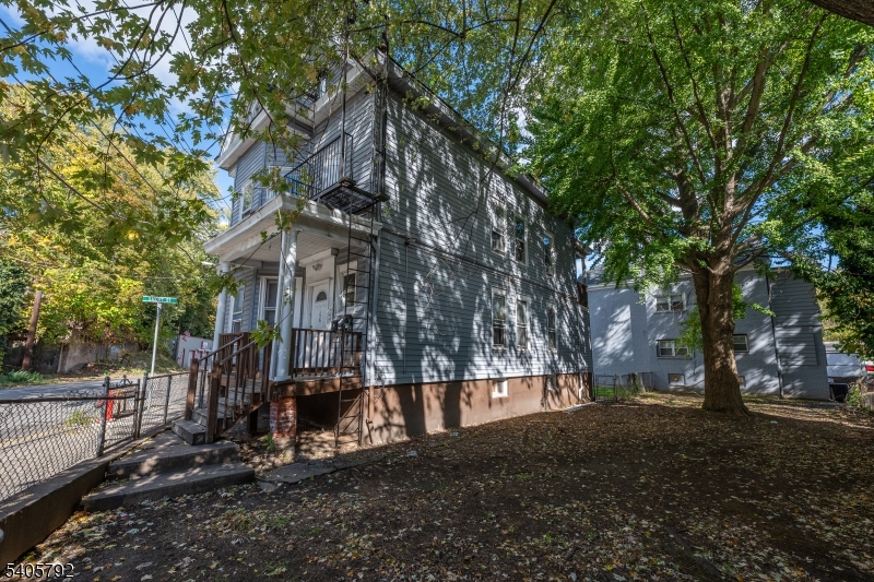 156 East Main Street Paterson, NJ 07522 - Photo 23 of 25 a view of a park with large trees