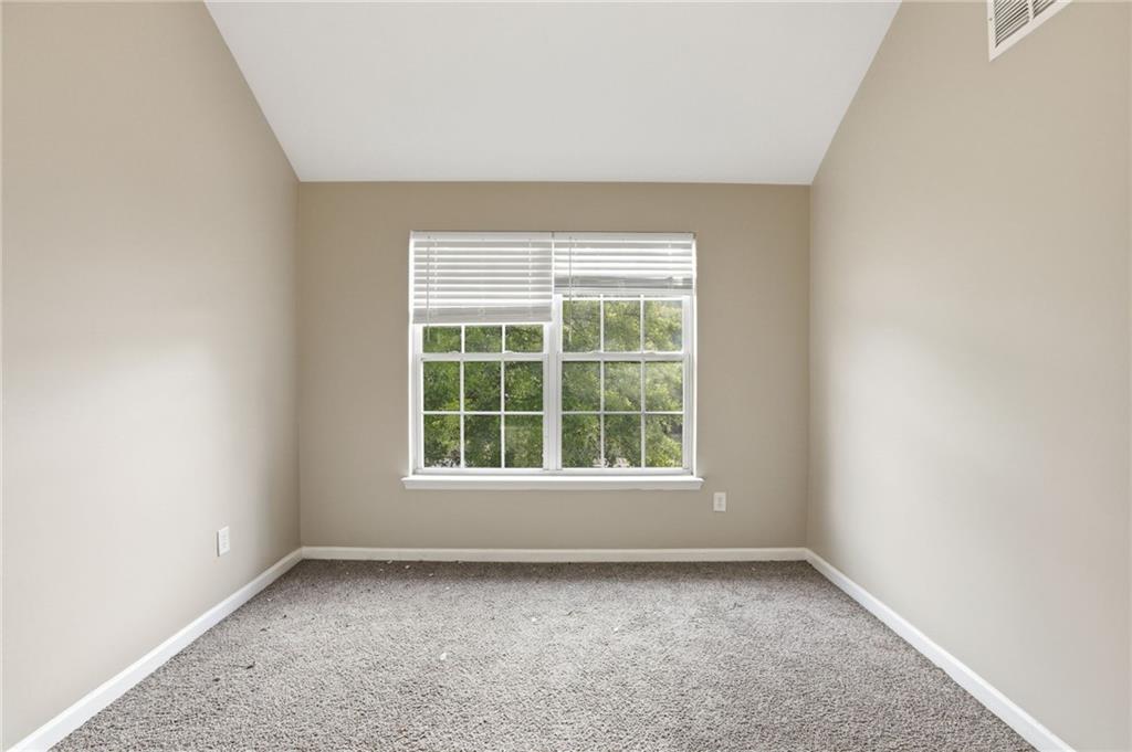 4968 Locherby Drive Fairburn, GA 30213 - Photo 30 of 39 an empty room with a window