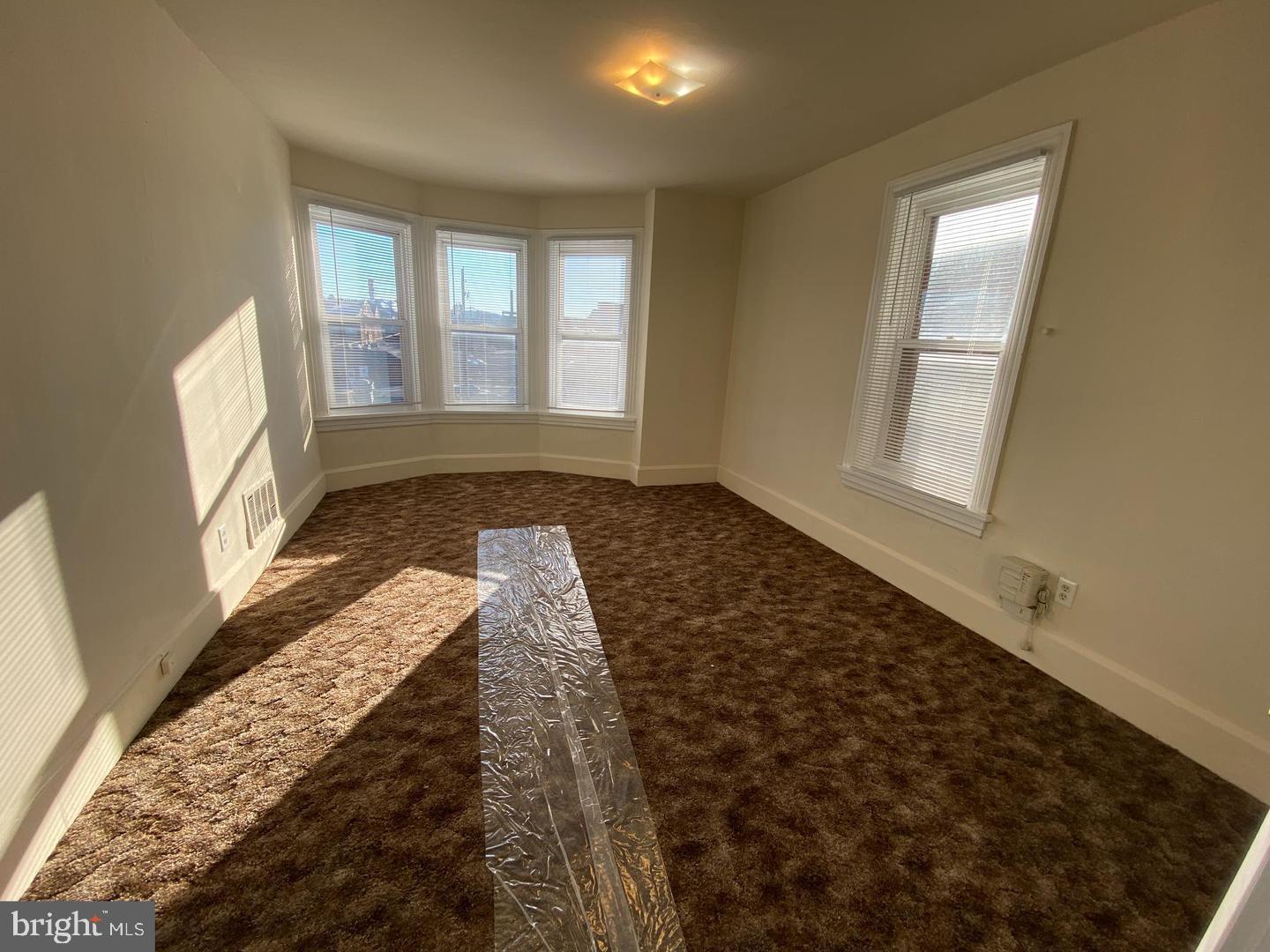 19 North Front Street Steelton, PA 17113 - Photo 2 of 14 a view of an empty room and window
