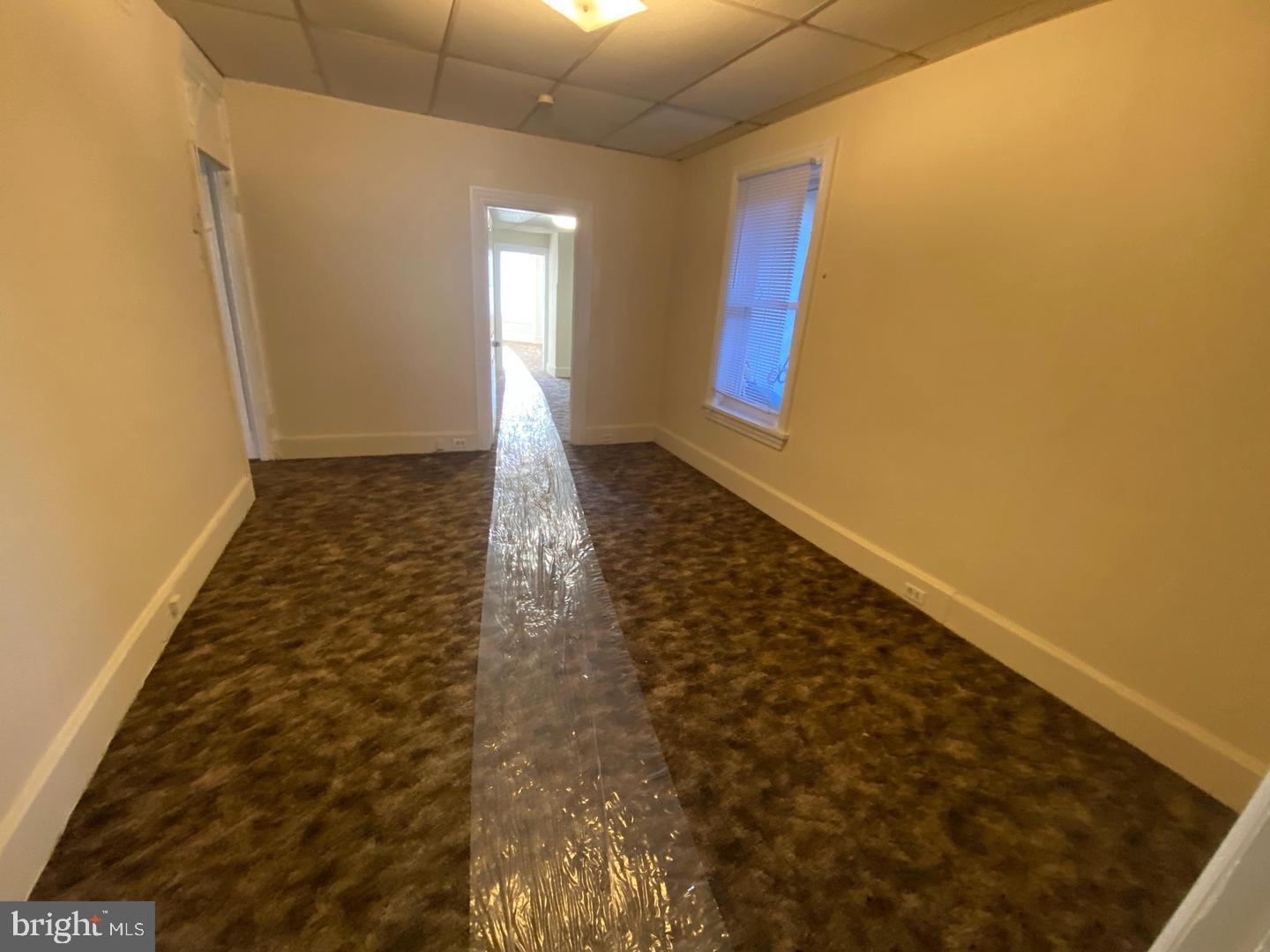 19 North Front Street Steelton, PA 17113 - Photo 3 of 14 a view of an empty room and window
