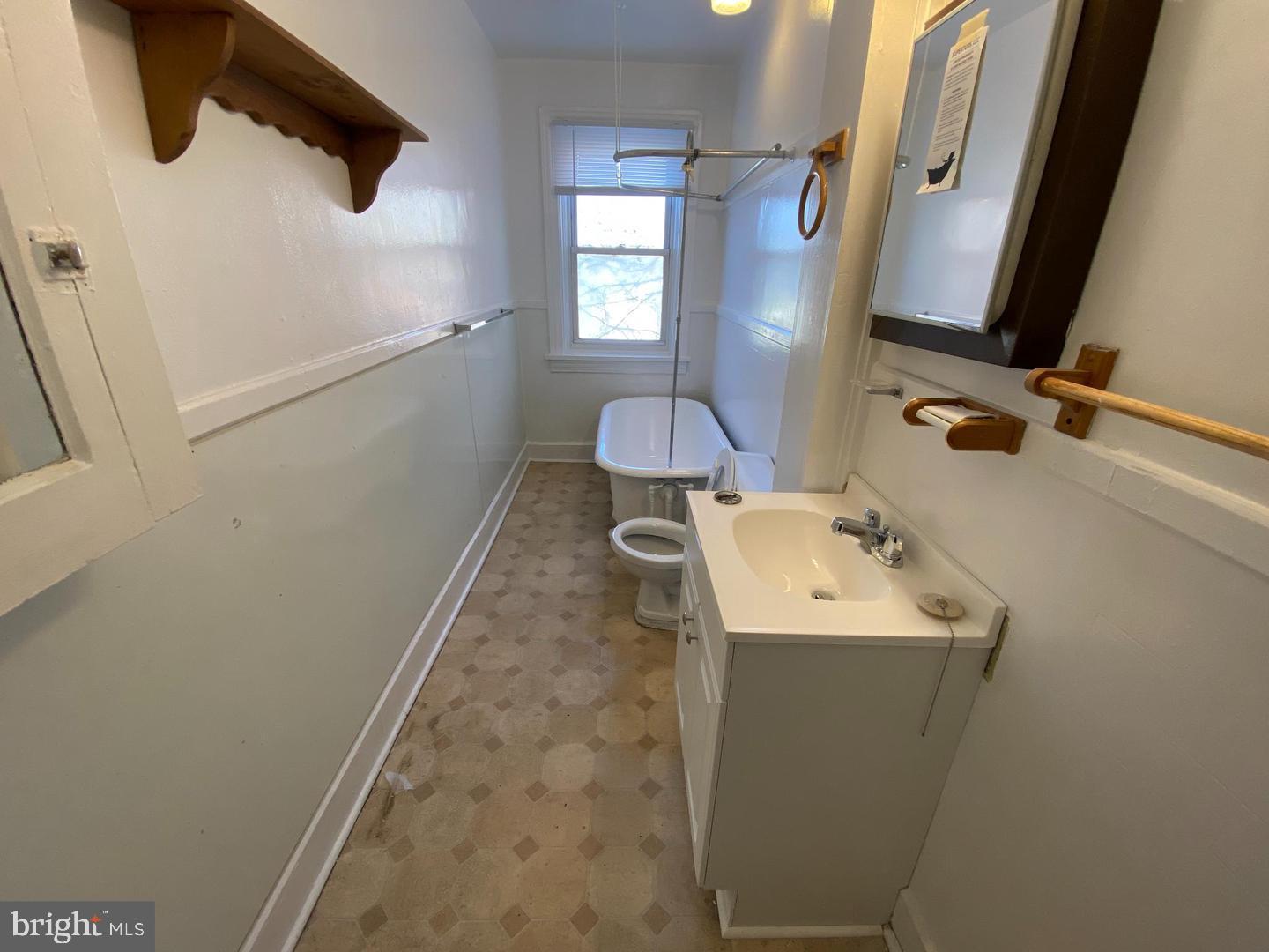 19 North Front Street Steelton, PA 17113 - Photo 6 of 14 a bathroom with a sink and mirror