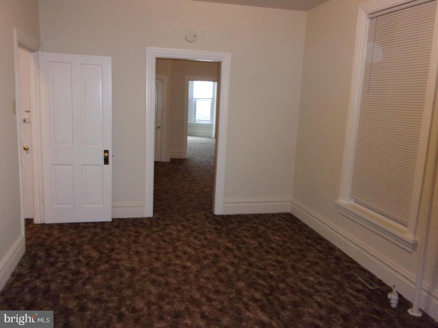 19 North Front Street Steelton, PA 17113 - Photo 7 of 14 wooden floor in an empty room