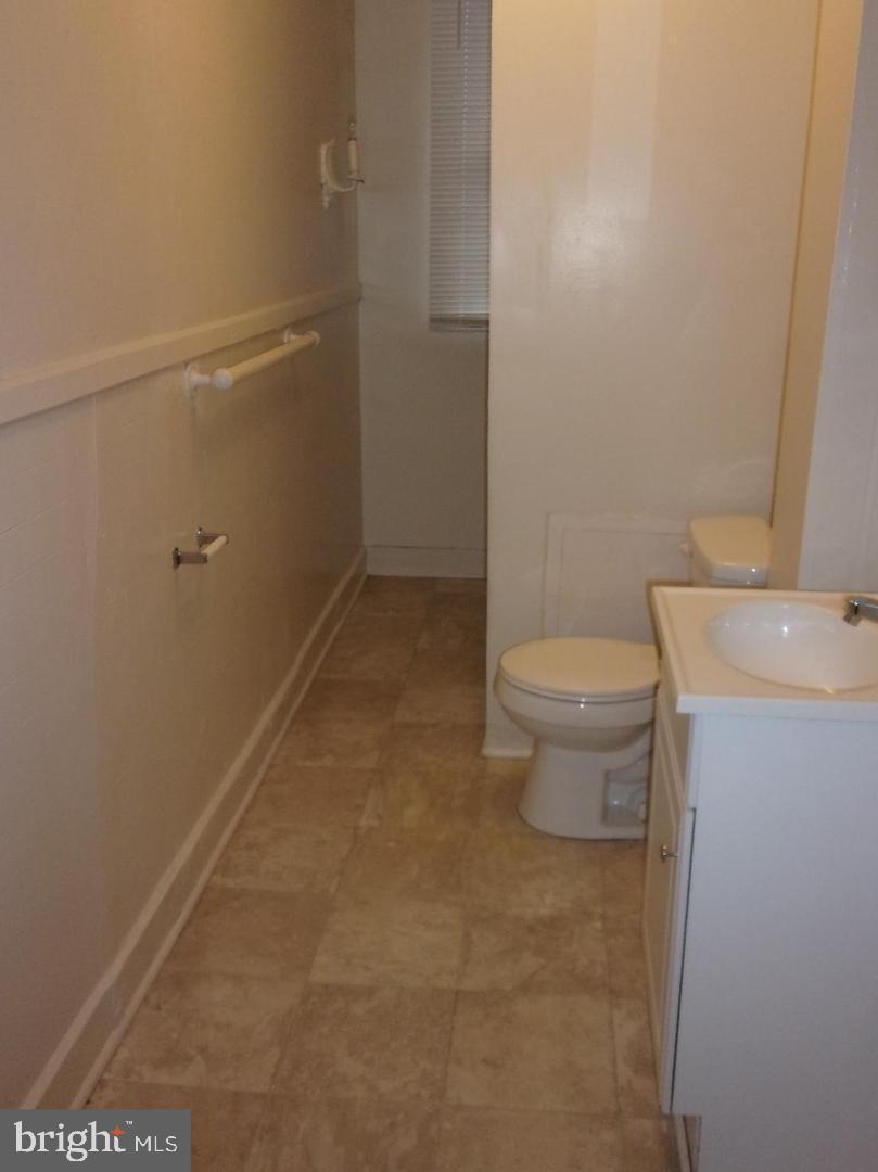 19 North Front Street Steelton, PA 17113 - Photo 10 of 14 a bathroom with a toilet and a sink