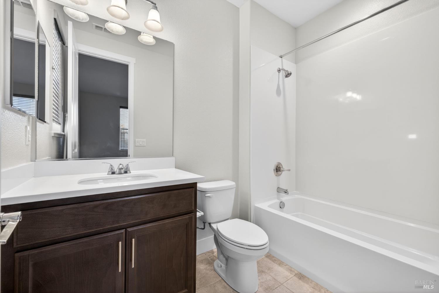 1273 Del Rancho Way Petaluma, CA 94954 - Photo 14 of 25 a bathroom with a sink a toilet and a mirror