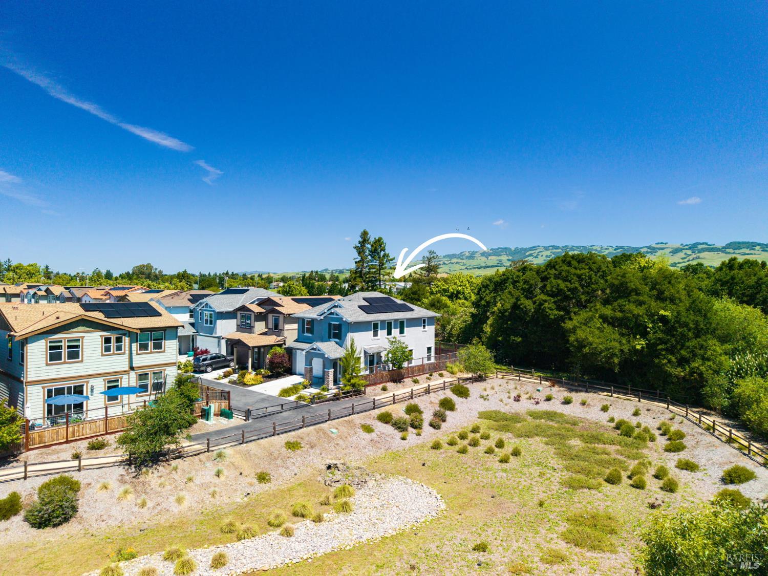 1273 Del Rancho Way Petaluma, CA 94954 - Photo 2 of 25 a view of a swimming pool with a lawn chairs