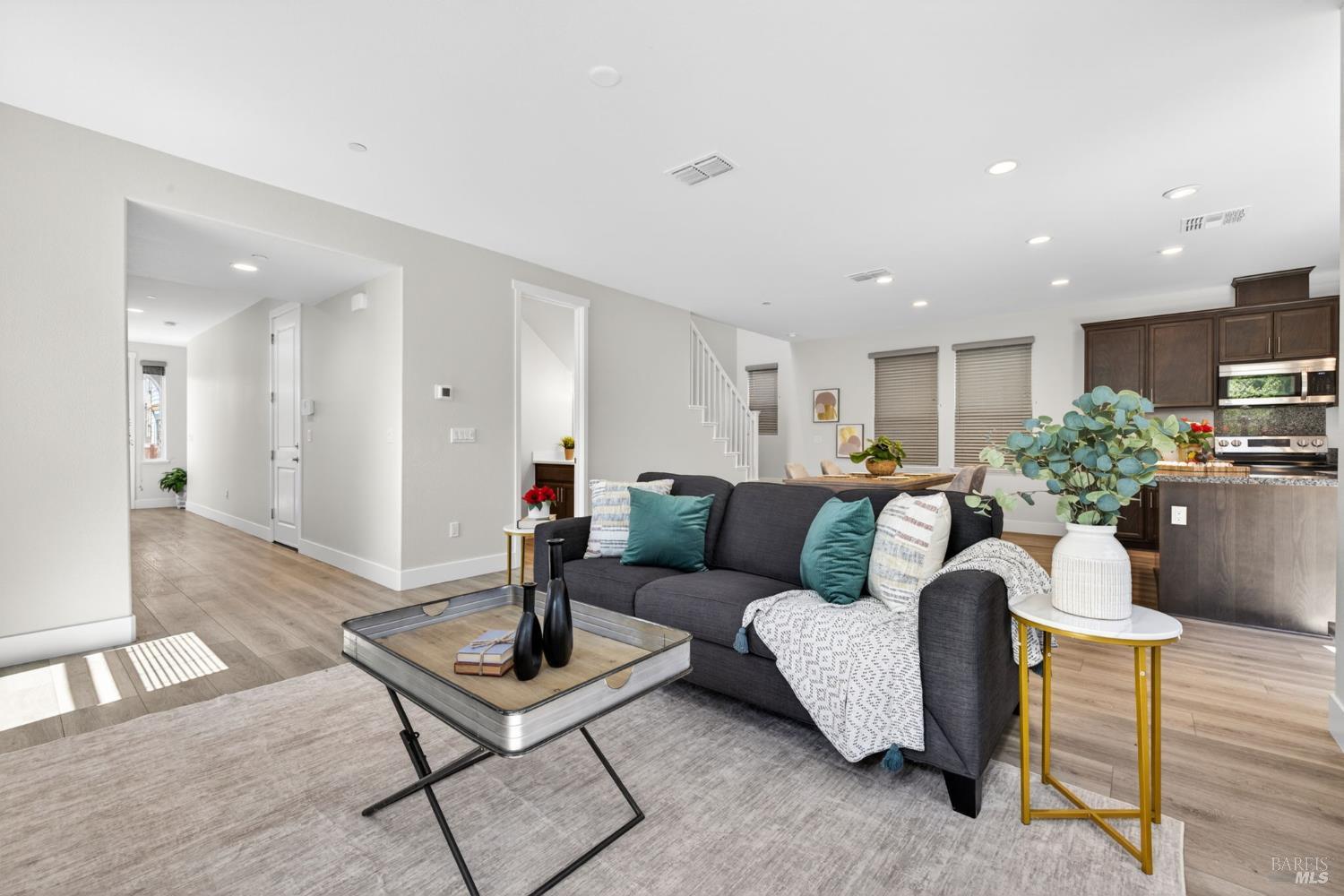 1273 Del Rancho Way Petaluma, CA 94954 - Photo 6 of 25 a living room with furniture and a wooden floor