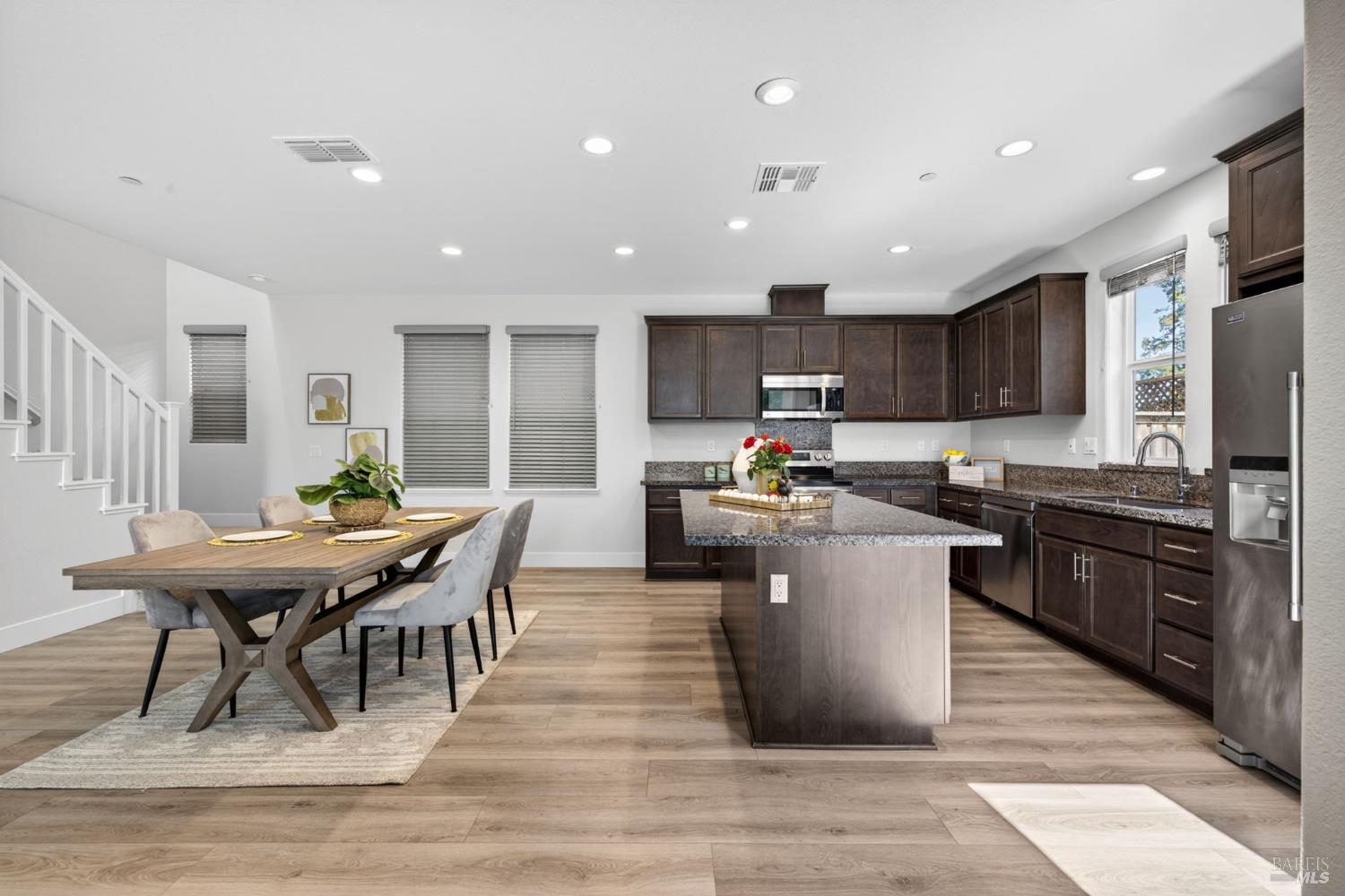1273 Del Rancho Way Petaluma, CA 94954 - Photo 7 of 25 a kitchen with a table and chairs in it