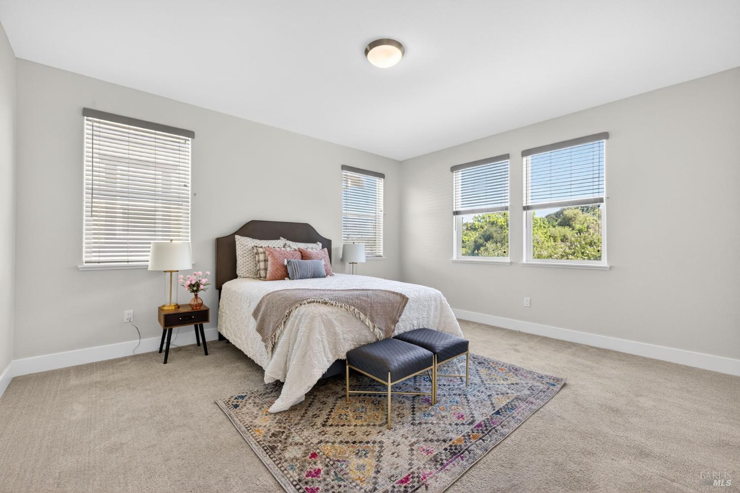 1273 Del Rancho Way Petaluma, CA 94954 - Photo 9 of 25 a spacious bedroom with a bed and a window