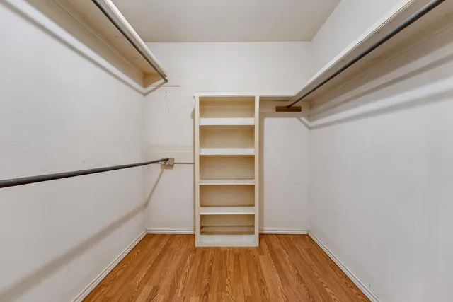 a view of an empty walk in closet