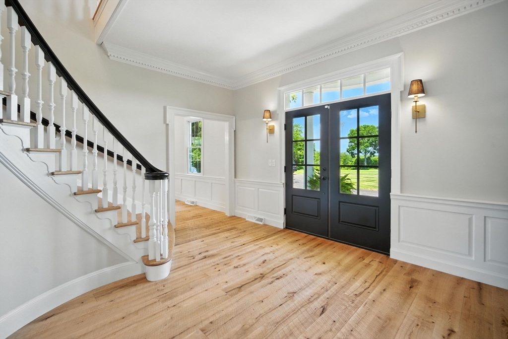 879 Russell Avenue Suffield, CT 06078 - Photo 3 of 40 a view of entryway and hall with wooden floor