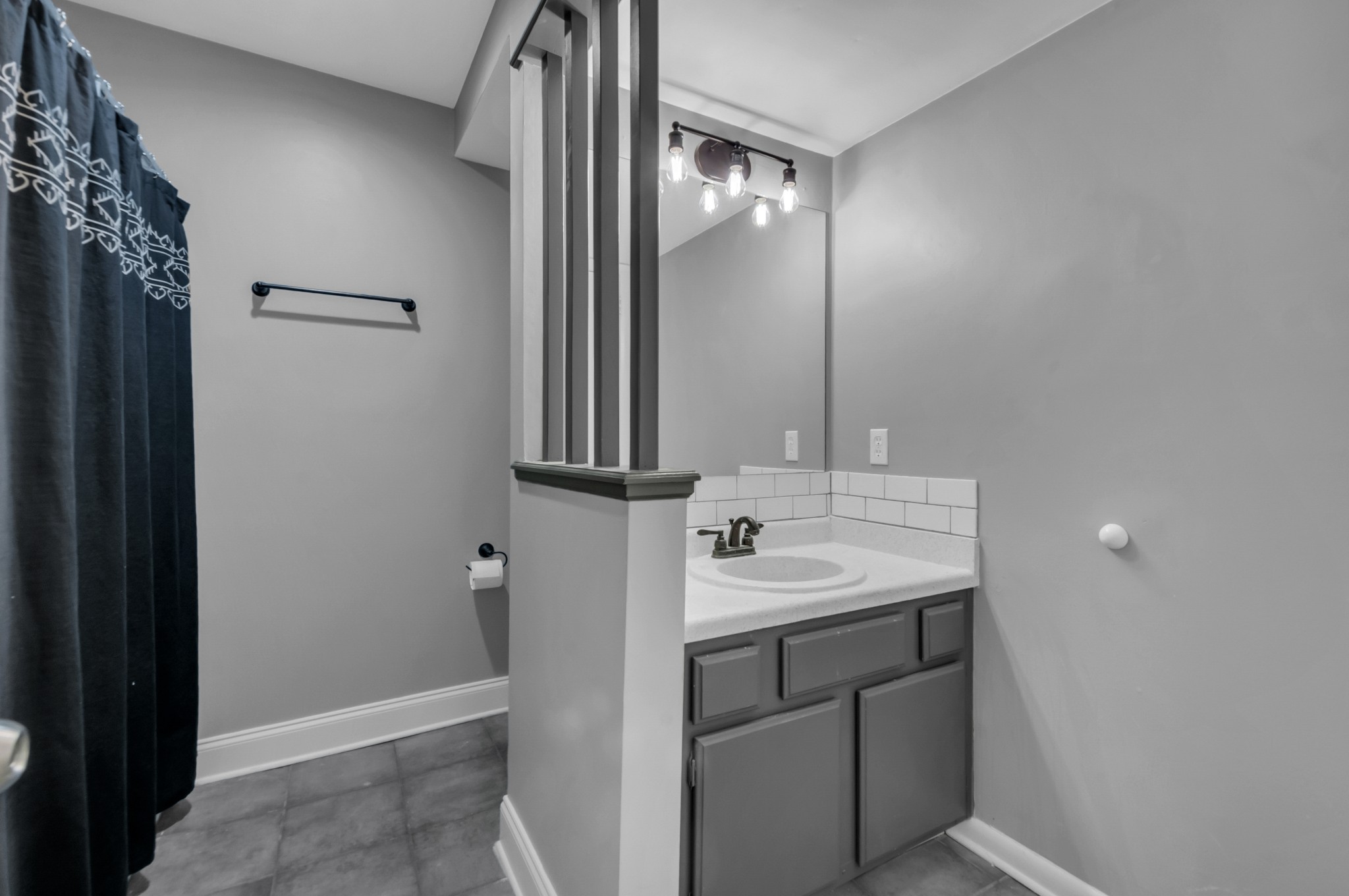 1418 Bell Trace Drive Antioch, TN 37013 - Photo 12 of 16 a bathroom with a sink and a mirror