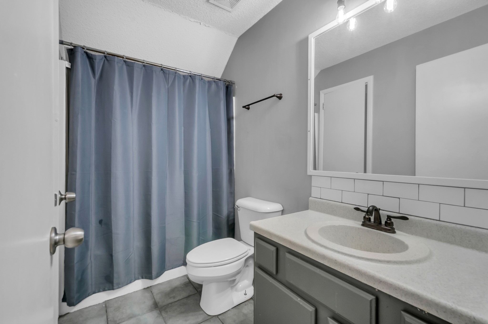 1418 Bell Trace Drive Antioch, TN 37013 - Photo 14 of 16 a bathroom with a sink a toilet and shower