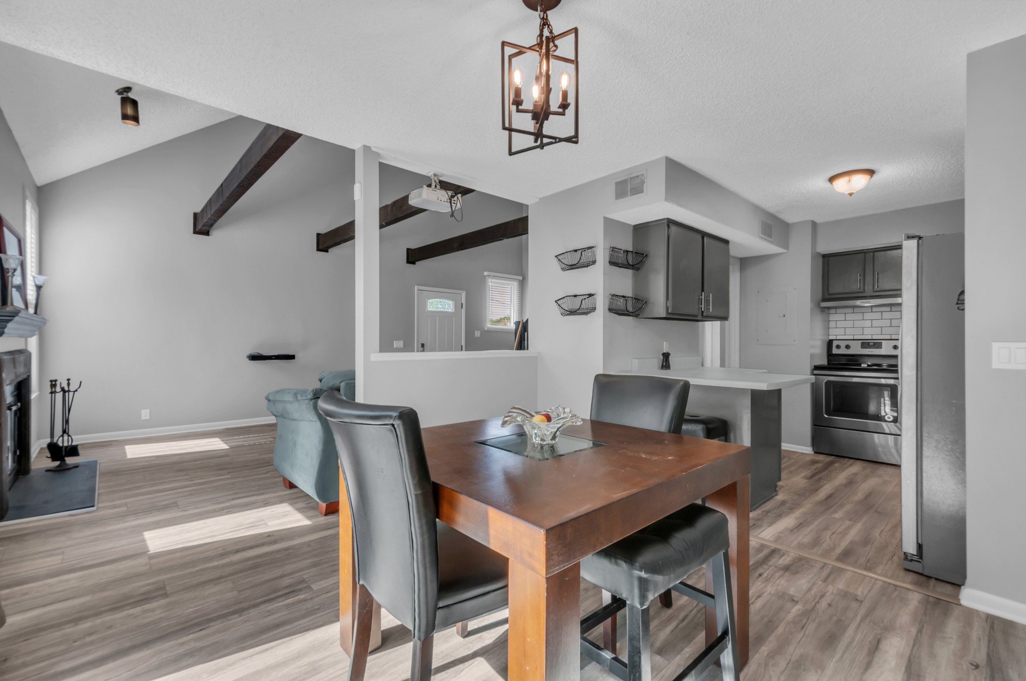 1418 Bell Trace Drive Antioch, TN 37013 - Photo 8 of 16 a view of a dining room with furniture and wooden floor