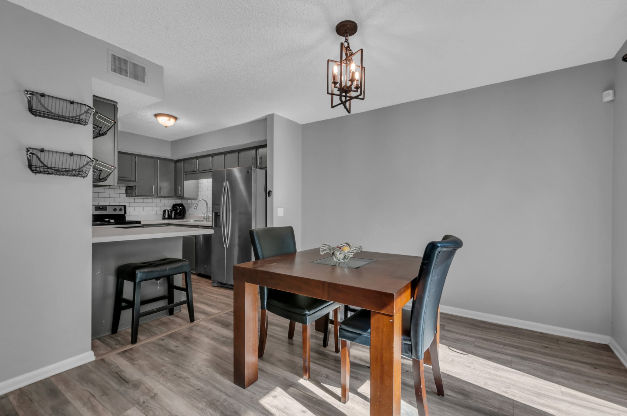 1418 Bell Trace Drive Antioch, TN 37013 - Photo 9 of 16 a view of a dining room with furniture and wooden floor