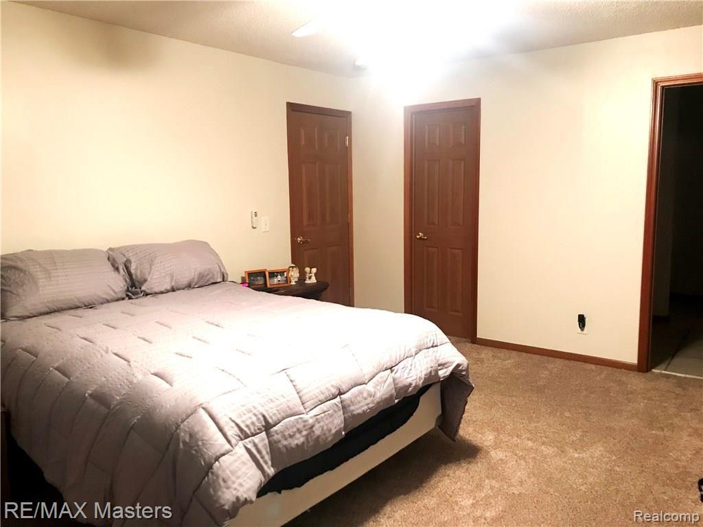 23205 Merriman Road New Boston, MI 48164 - Photo 28 of 49 Master Bedroom