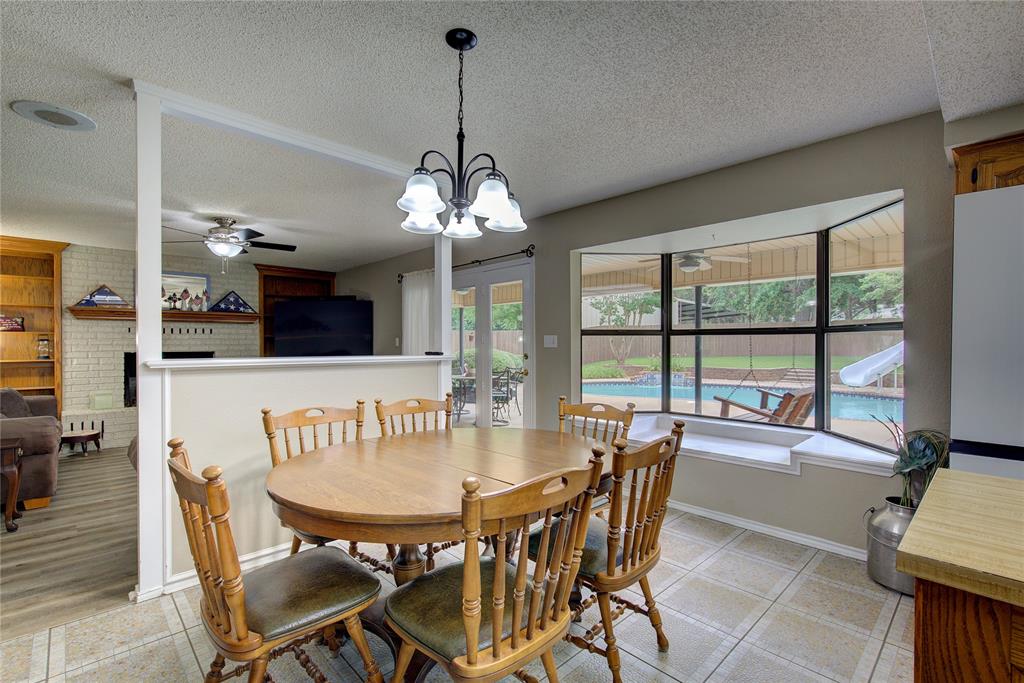 753 County Rd SW 3110 Mount Vernon, TX 75457 - Photo 14 of 40 Breakfast area has amazing bay window with built-in seating bench overlooking the pool!