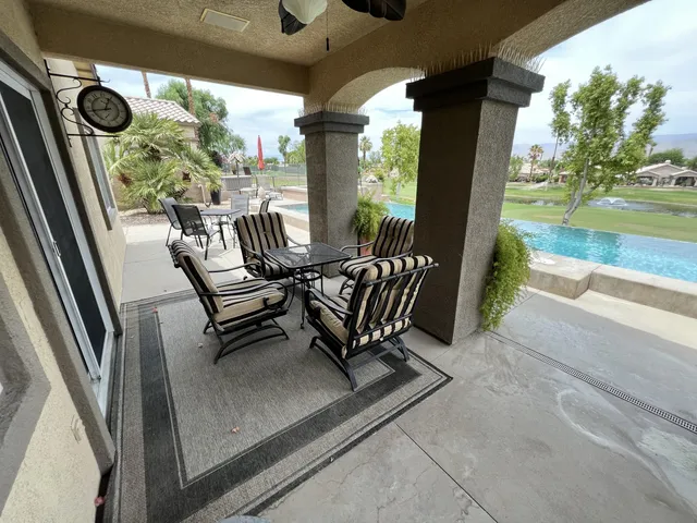 a view of a two chair in the balcony