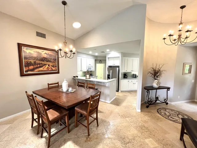 a view of a dining room with furniture