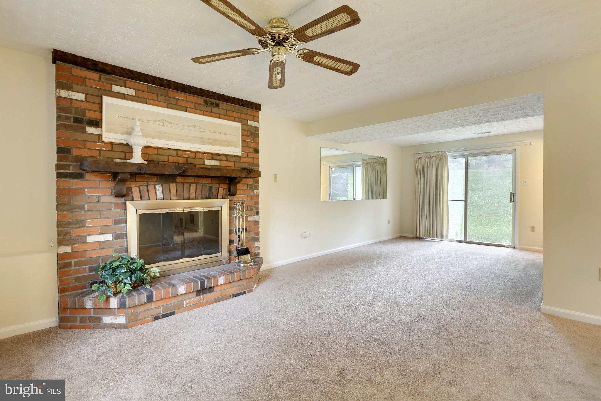 11715 Whittier Road Bowie, MD 20721 - Photo 21 of 30 Family Room with WB Fireplace and Brick Hearth