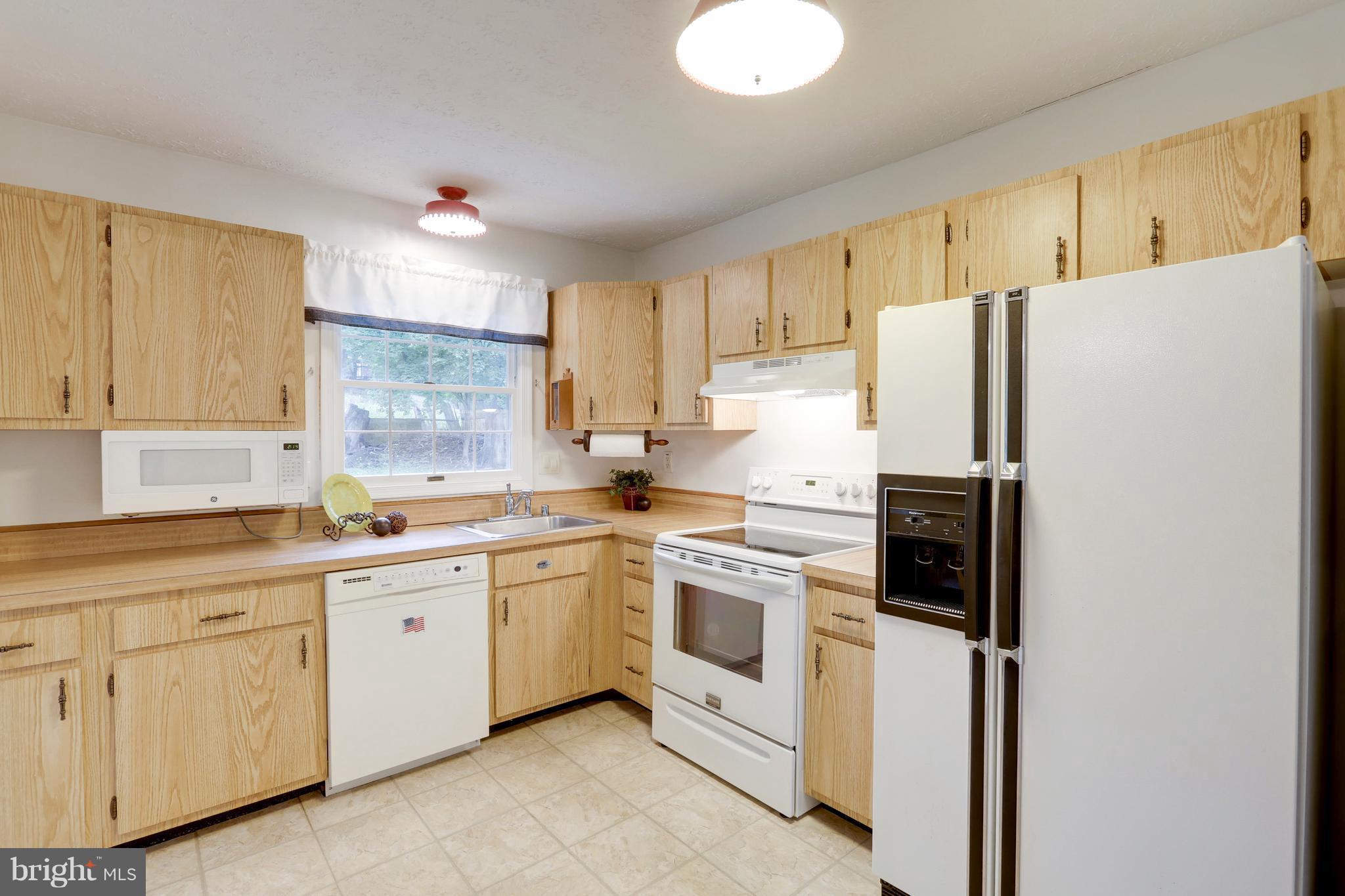 11715 Whittier Road Bowie, MD 20721 - Photo 5 of 30 Kitchen with Wood Cabinets