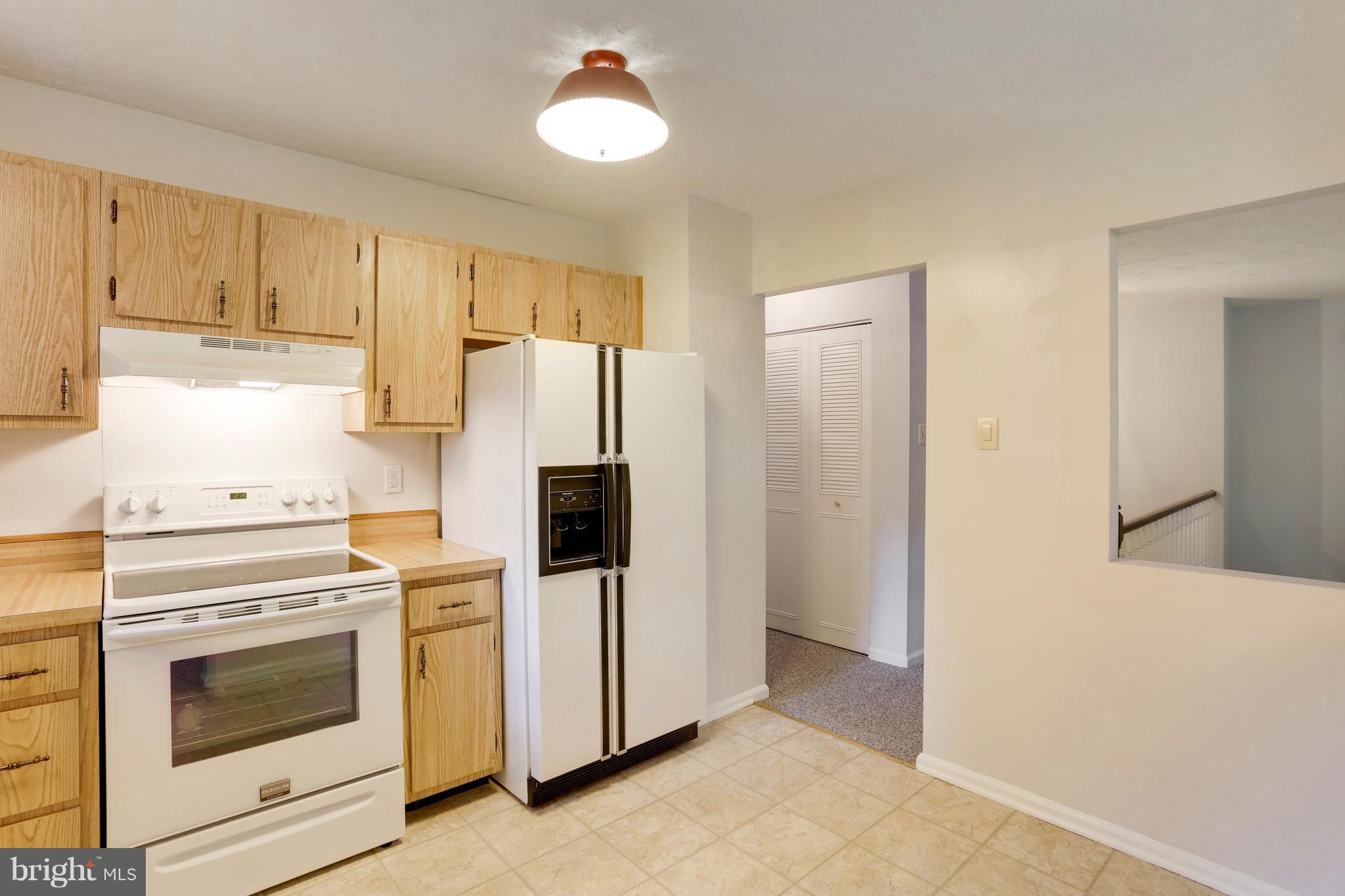 11715 Whittier Road Bowie, MD 20721 - Photo 6 of 30 Kitchen open to Dining Area and Living Room