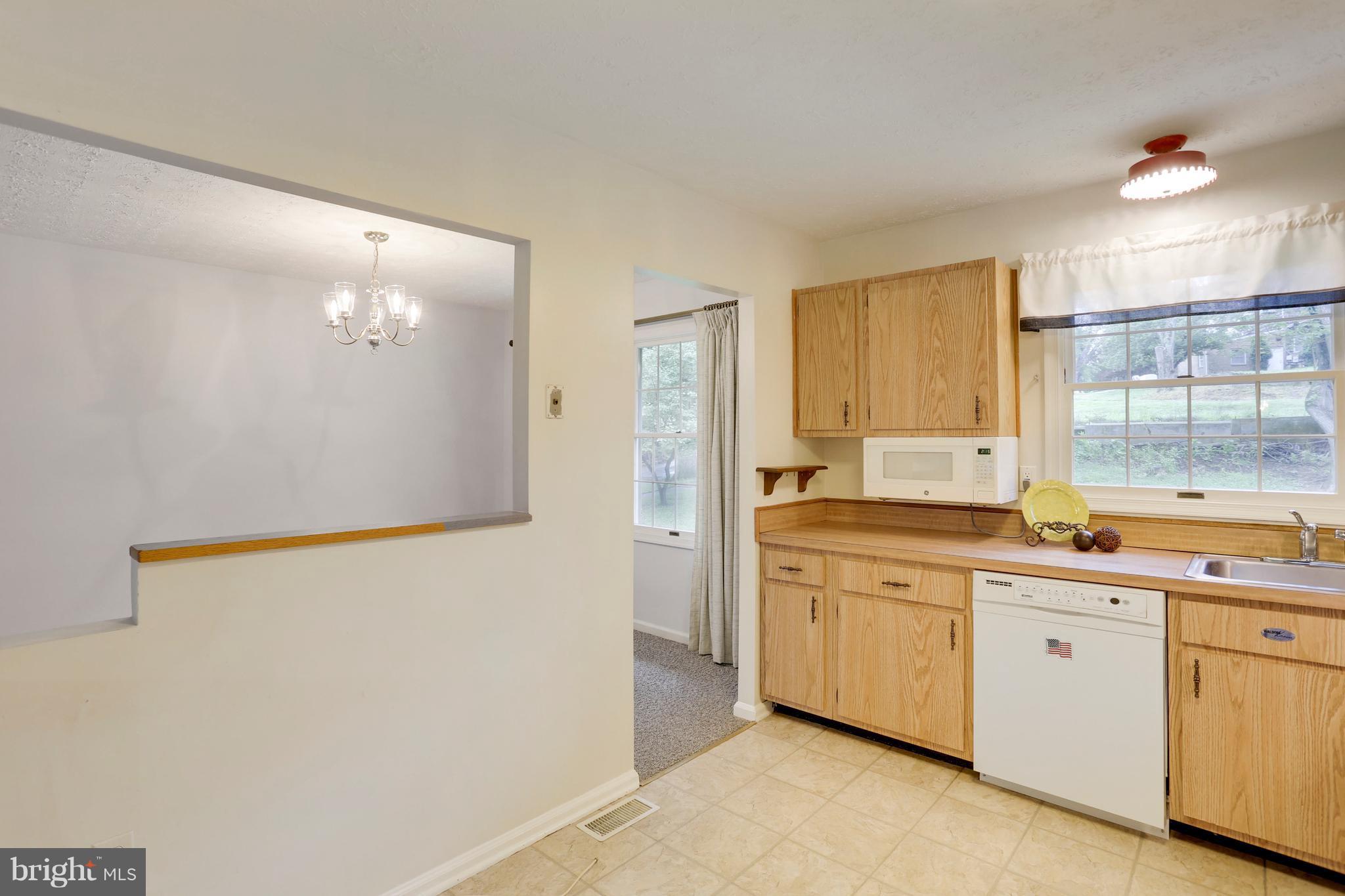 11715 Whittier Road Bowie, MD 20721 - Photo 7 of 30 Kitchen open to Dining Area