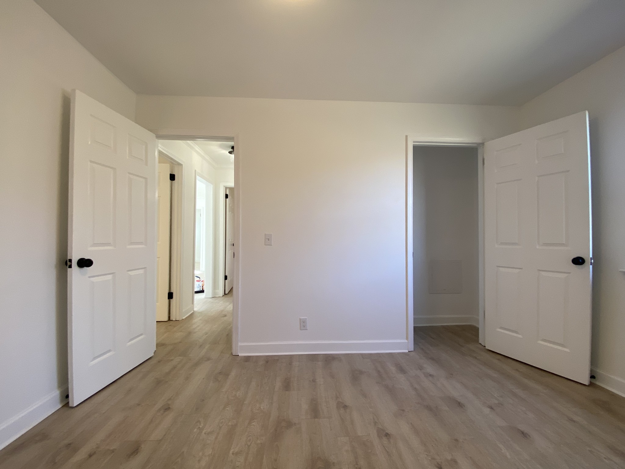 245 Raintree Drive Clarksville, TN 37042 - Photo 14 of 33 a view of an empty room with wooden floor