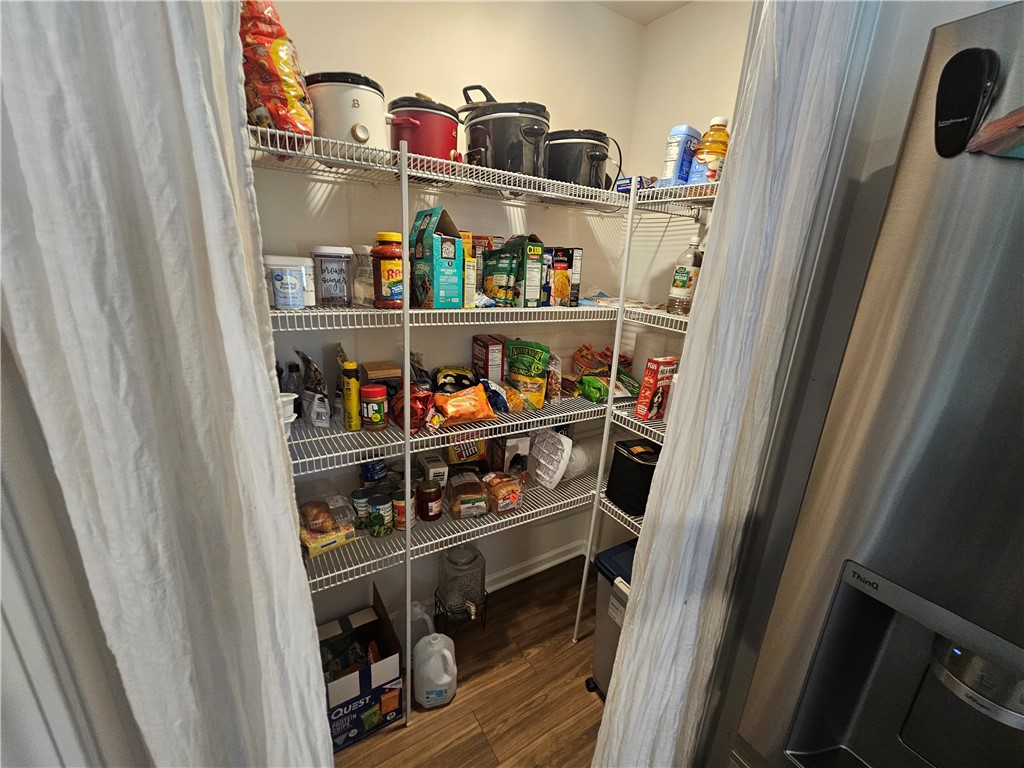 902 Ashwood Lane Easley, SC 29640 - Photo 14 of 39 Ample storage for kitchen essentials within this well-organized pantry.
