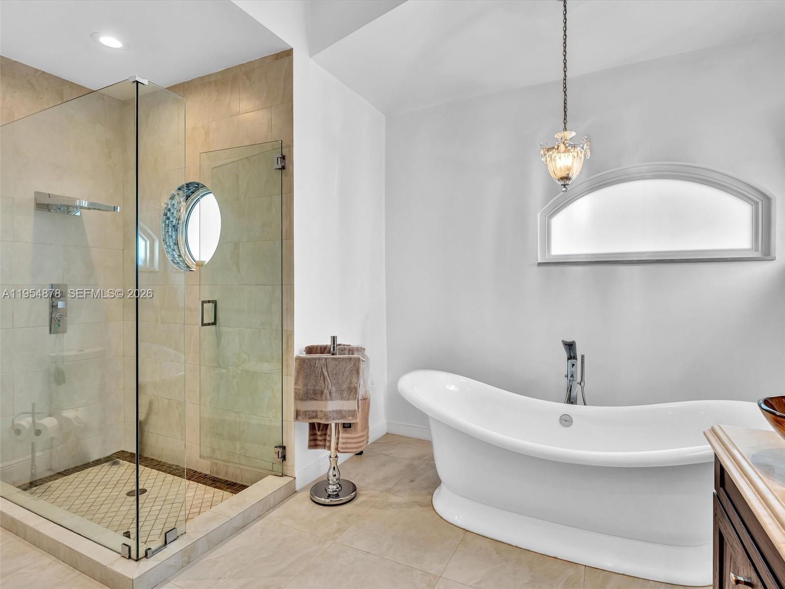 900 Spoonbill Circle Weston, FL 33326 - Photo 27 of 51 a bathroom with a sink a toilet and shower