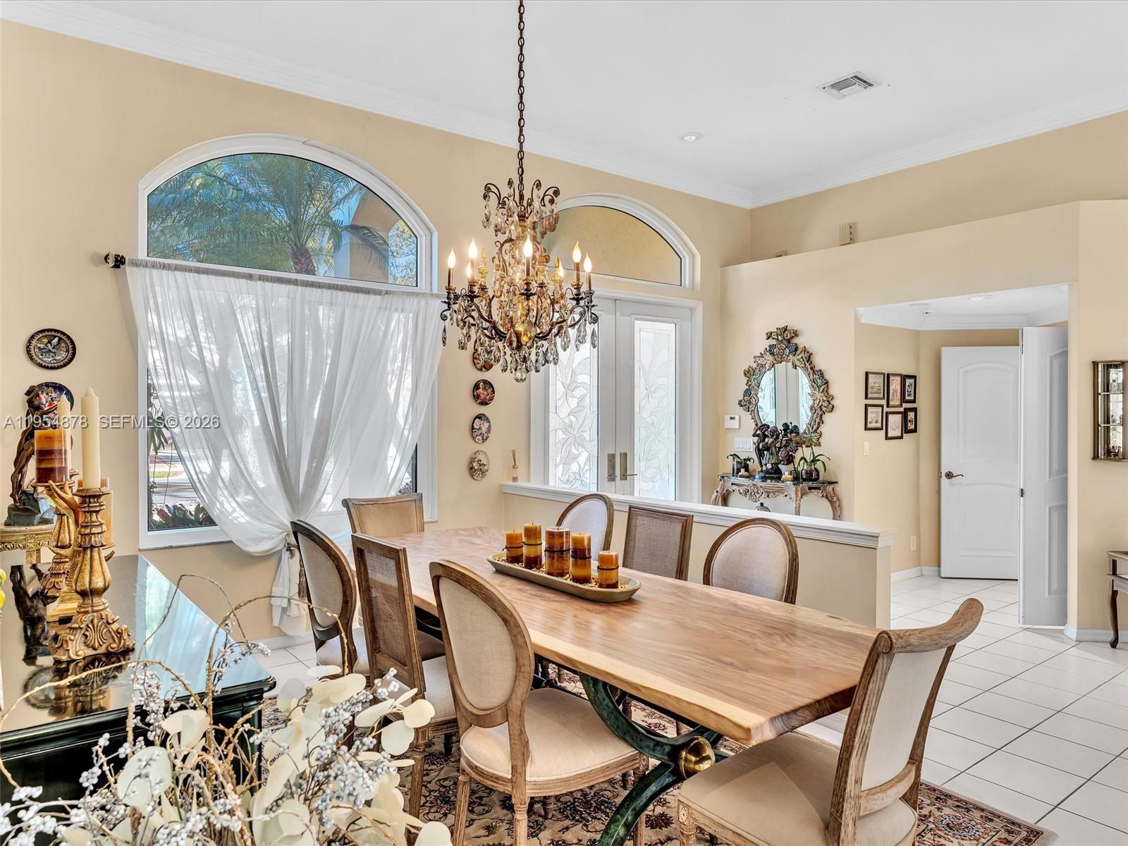 900 Spoonbill Circle Weston, FL 33326 - Photo 9 of 51 a view of a a dining room with furniture window and outside view