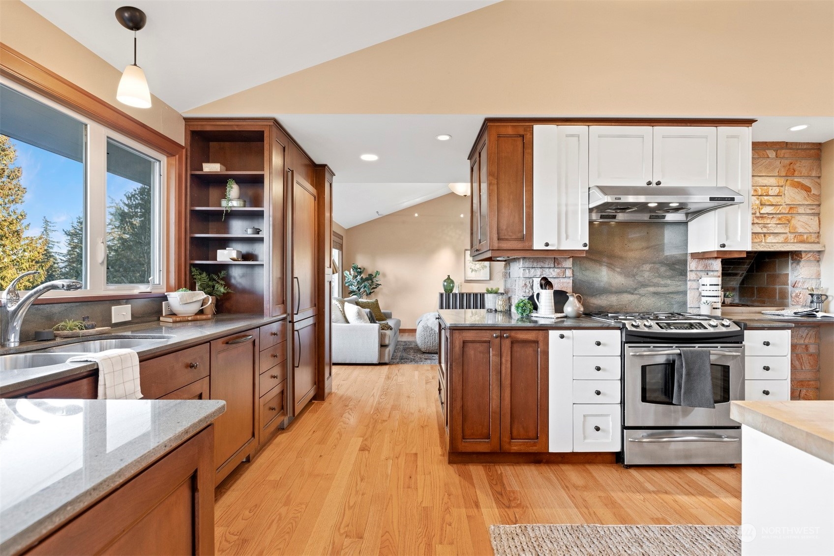 131 Hawthorn Road Bellingham, WA 98225 - Photo 11 of 40 a large kitchen with stainless steel appliances granite countertop a stove and a sink