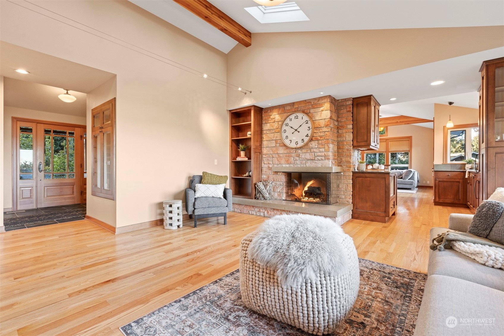 131 Hawthorn Road Bellingham, WA 98225 - Photo 7 of 40 a living room with furniture and a fireplace