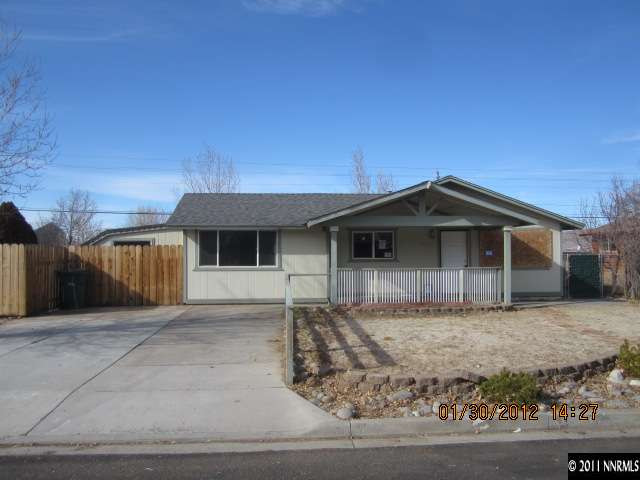 a front view of a house with a garage