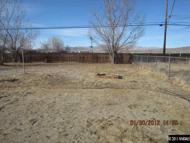 9375 Fremont Way Reno, NV 89506 - Photo 2 of 12 a view of a yard with a bench
