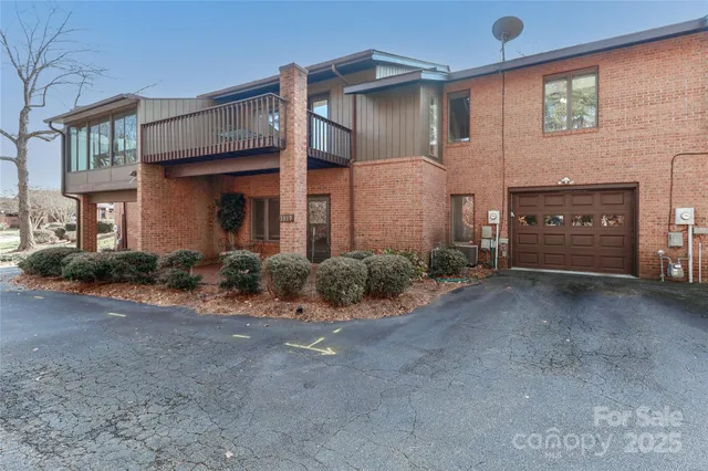 a view of a house with a street