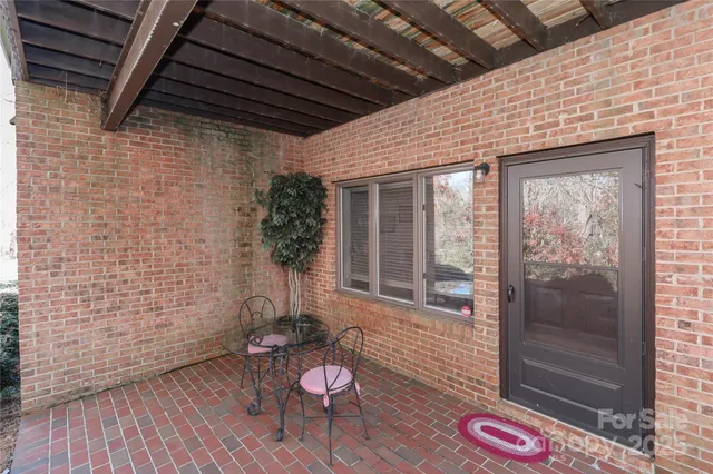 a view of a porch with furniture